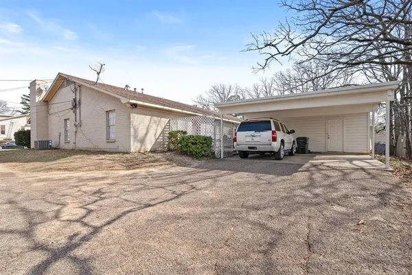 a view of a car garage of a house