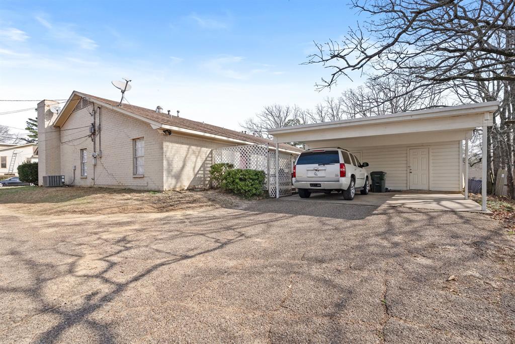 2103 Easy Street Tyler, TX 75703 - Photo 20 of 32 a view of a car garage of a house