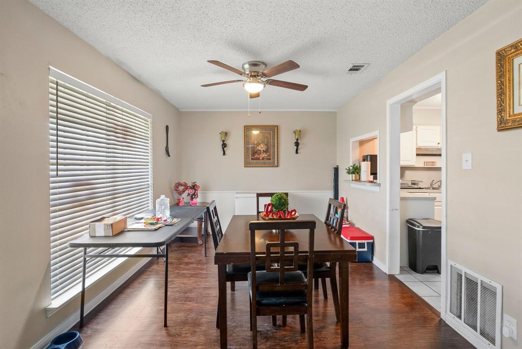 2103 Easy Street Tyler, TX 75703 - Photo 6 of 32 a view of a dining room with furniture and a window