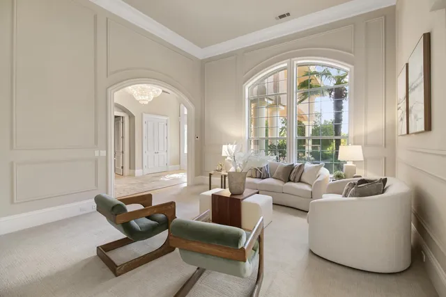 a living room with furniture and a area