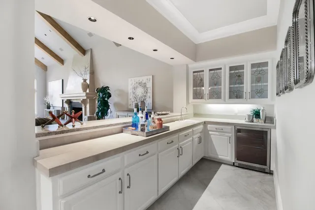 a kitchen with stainless steel appliances granite countertop a sink and cabinets