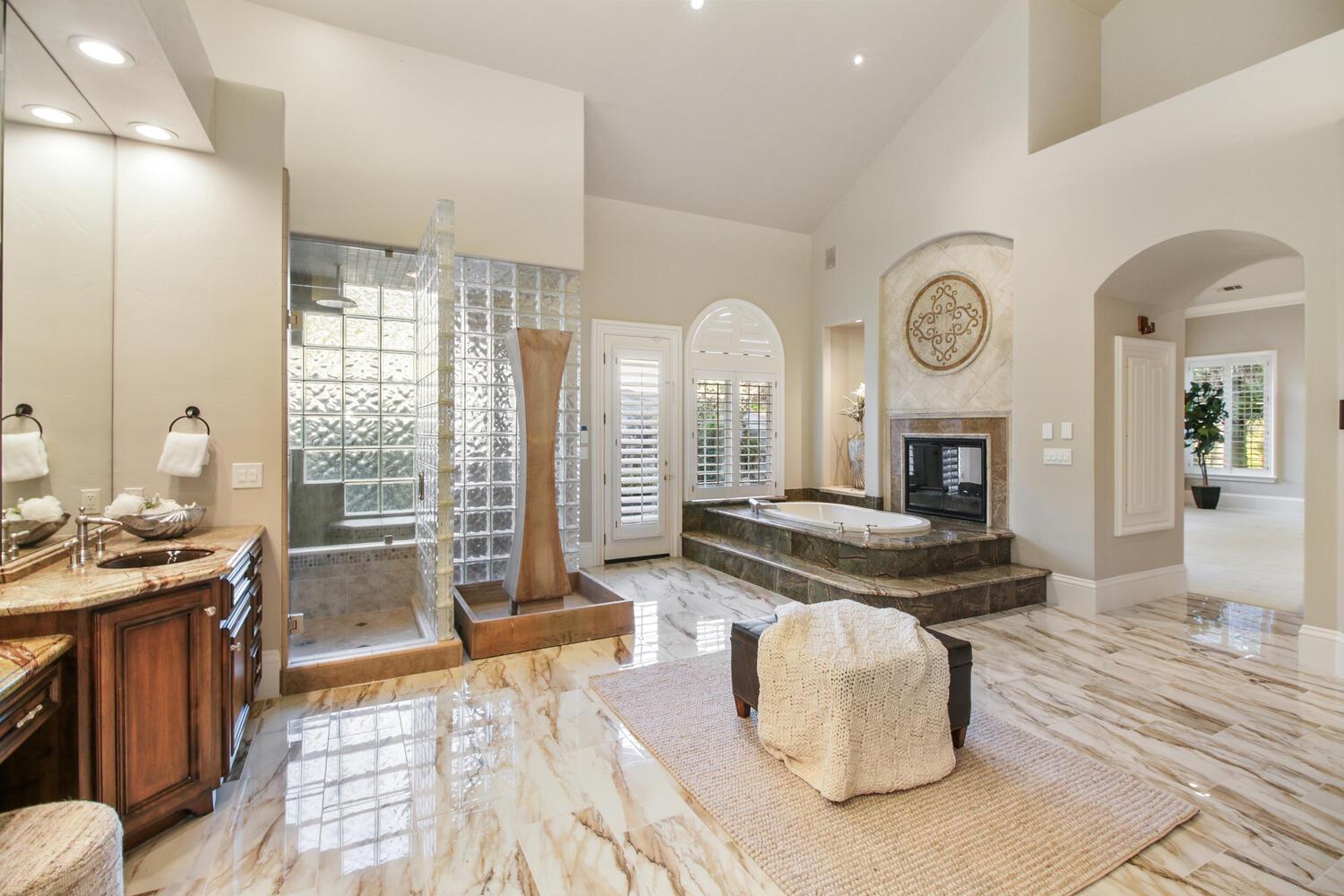 5001 Auburn Folsom Road Loomis, CA 95650 - Photo 44 of 99 a living room with fireplace furniture and a large window