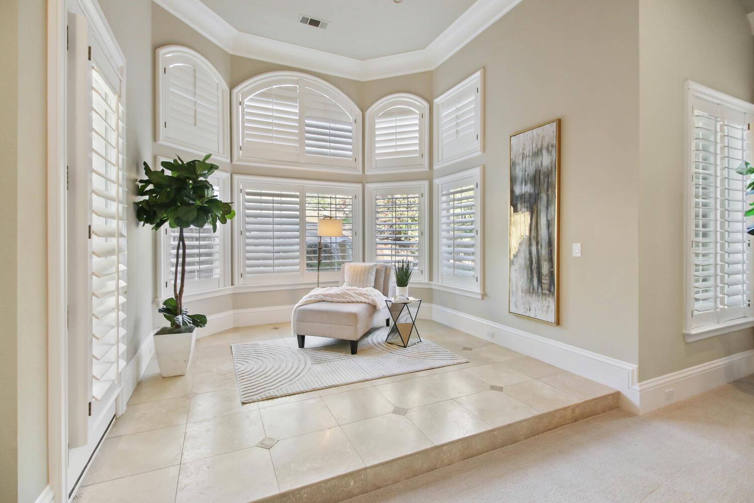 5001 Auburn Folsom Road Loomis, CA 95650 - Photo 45 of 99 a living room with furniture and a potted plant
