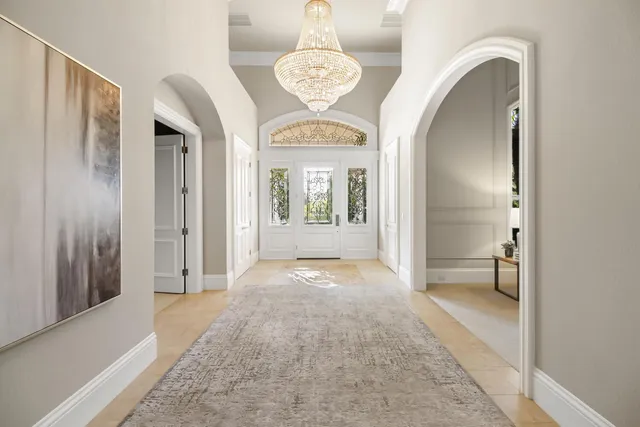 a living room with furniture fireplace and flat screen tv