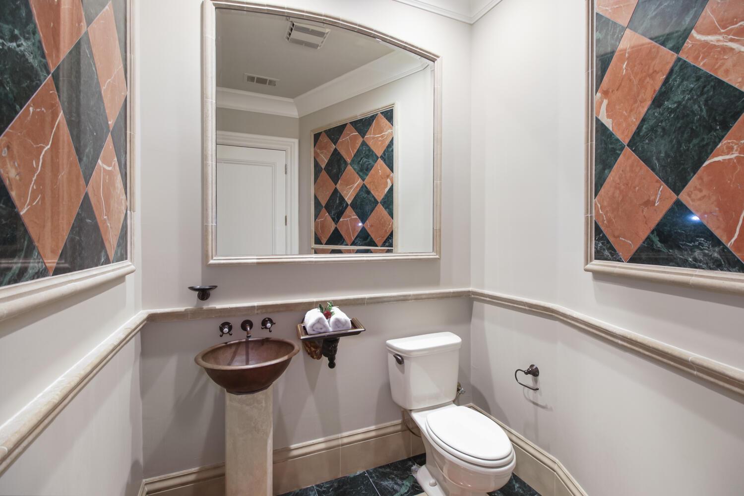 5001 Auburn Folsom Road Loomis, CA 95650 - Photo 61 of 99 a bathroom with a toilet and a sink