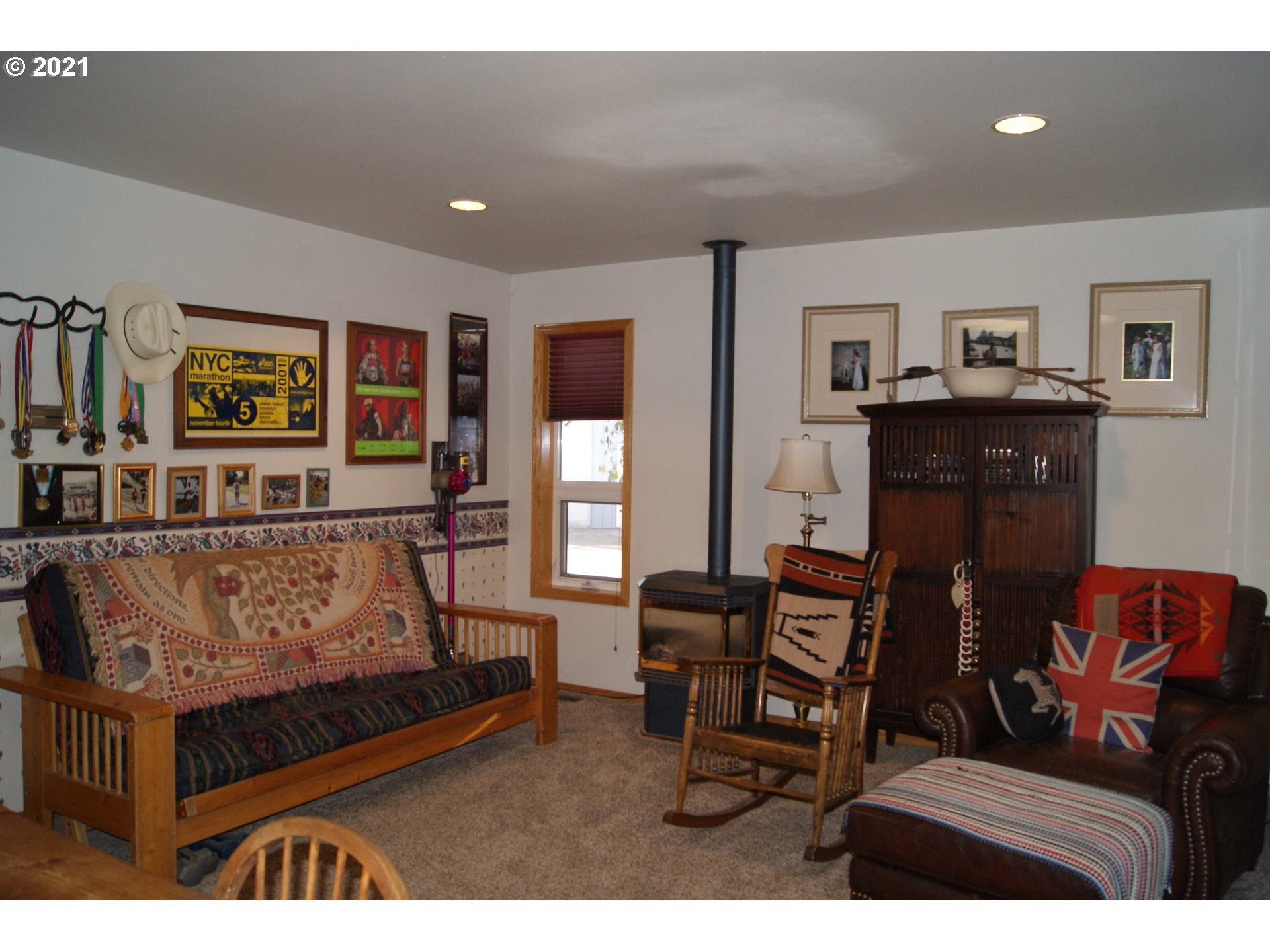 69398 County 1021 Road Pendleton, OR 97801 - Photo 17 of 28 a living room with furniture and a flat screen tv