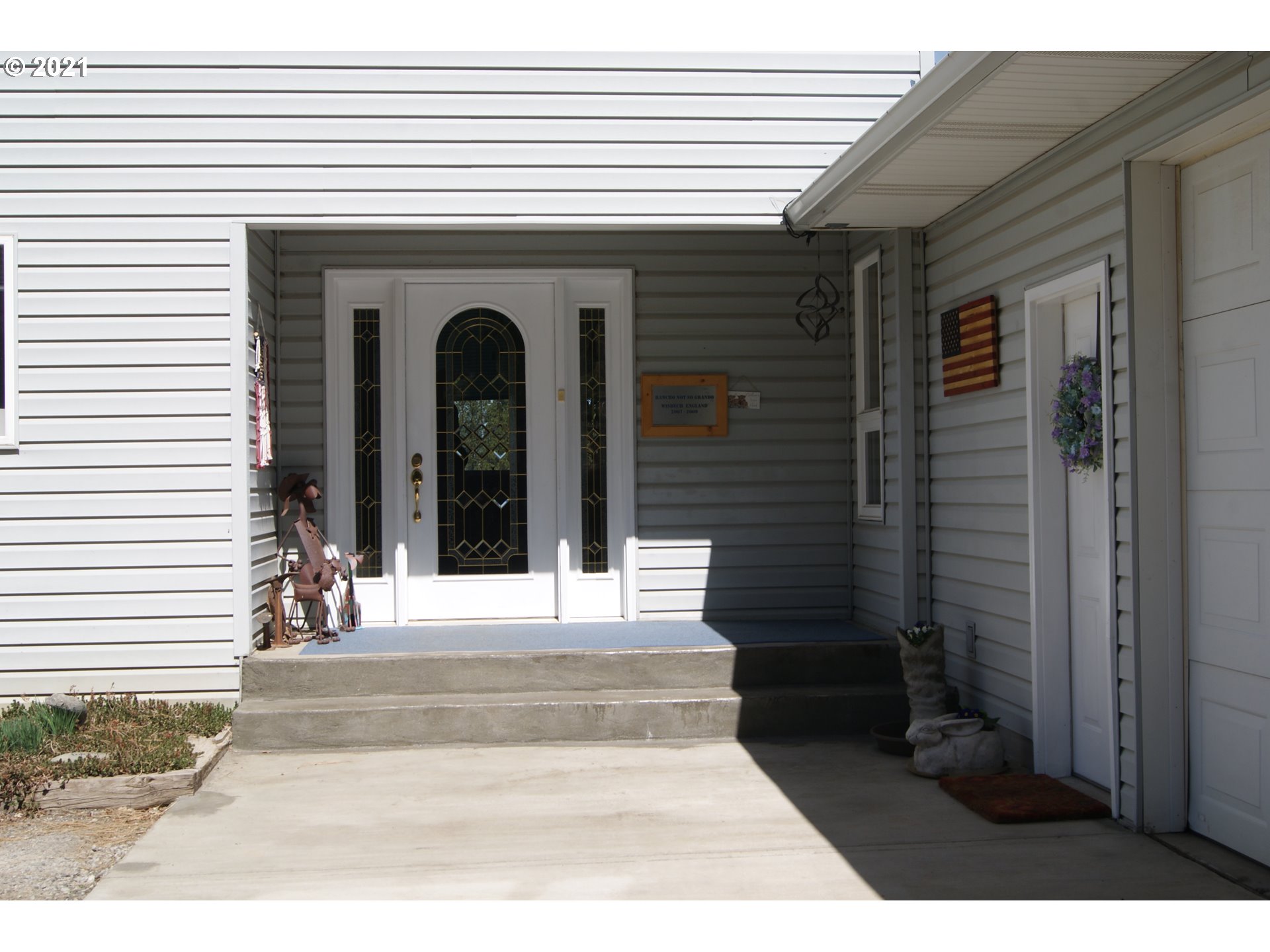 69398 County 1021 Road Pendleton, OR 97801 - Photo 2 of 28 a view of a brick house with a large windows