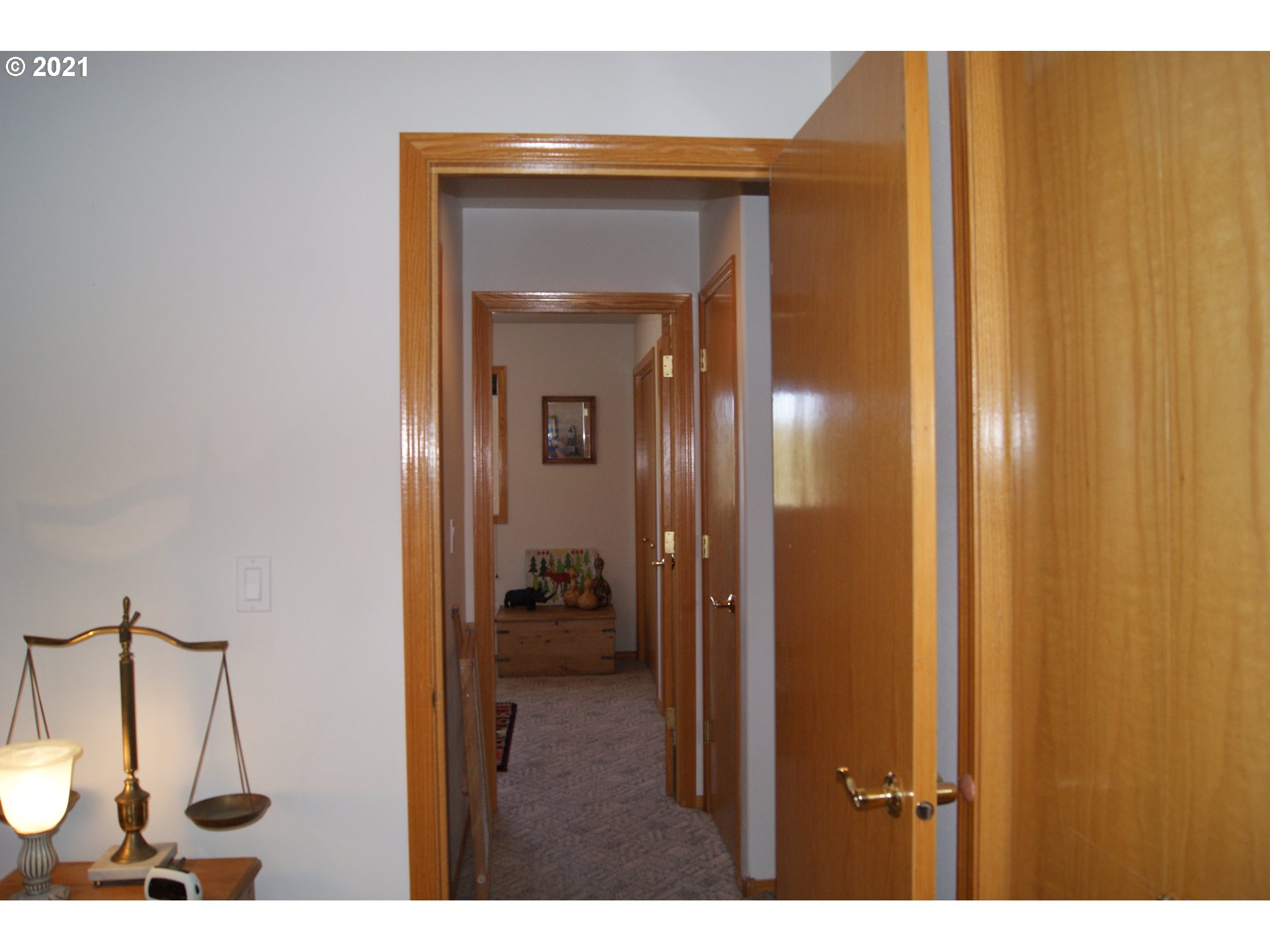 69398 County 1021 Road Pendleton, OR 97801 - Photo 7 of 28 a view of a bathroom from a hallway