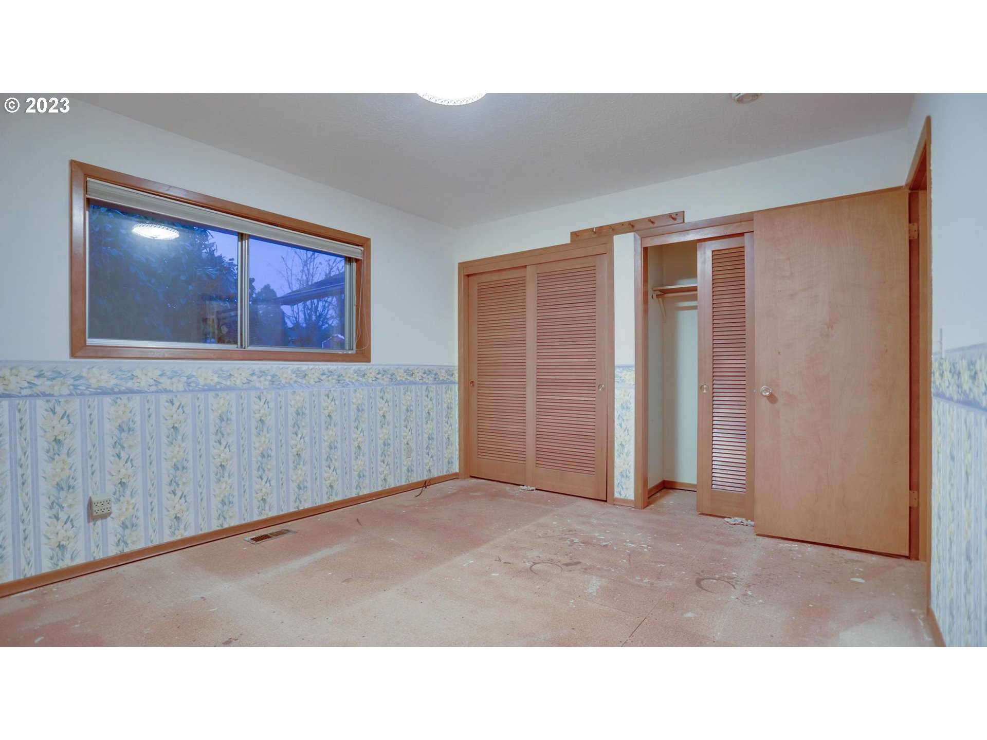 21985 Southeast Borges Road Damascus, OR 97089 - Photo 11 of 24 a open living room with a hallway and wooden floor
