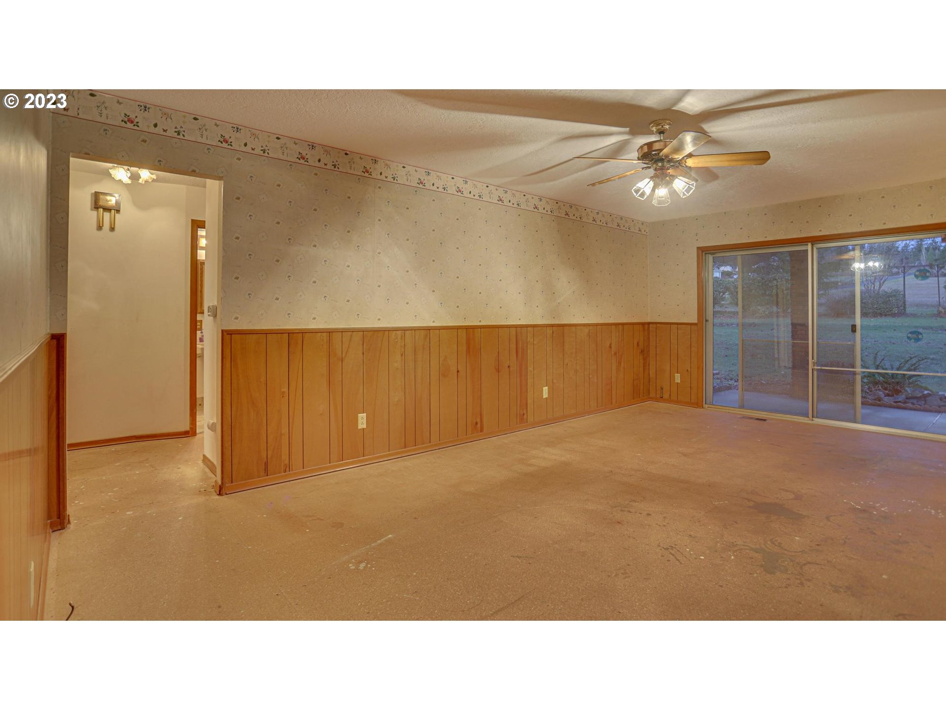 21985 Southeast Borges Road Damascus, OR 97089 - Photo 10 of 24 a open hall with a ceiling fan