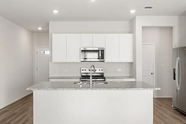 $2,000 | 12811 Village Spun Plaza, Buda, TX 78610