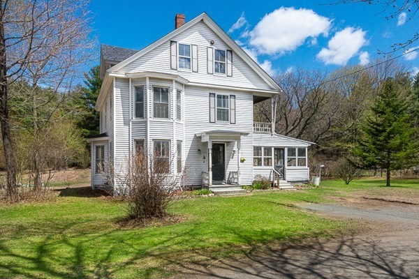 7 Ipswich Road Boxford, MA 01921 - Photo 1 of 1 a front view of a house with garden