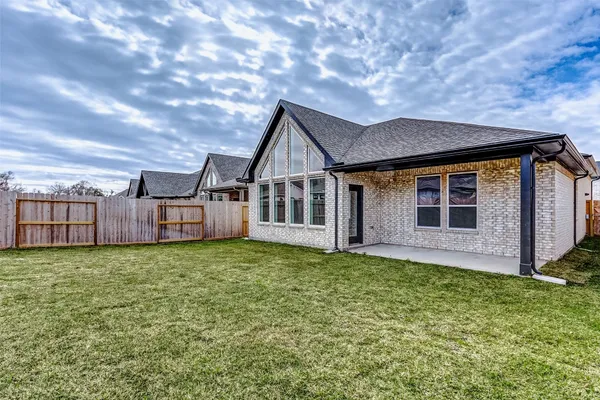 a house view with a garden space
