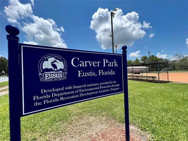 a view of swimming pool with seating area