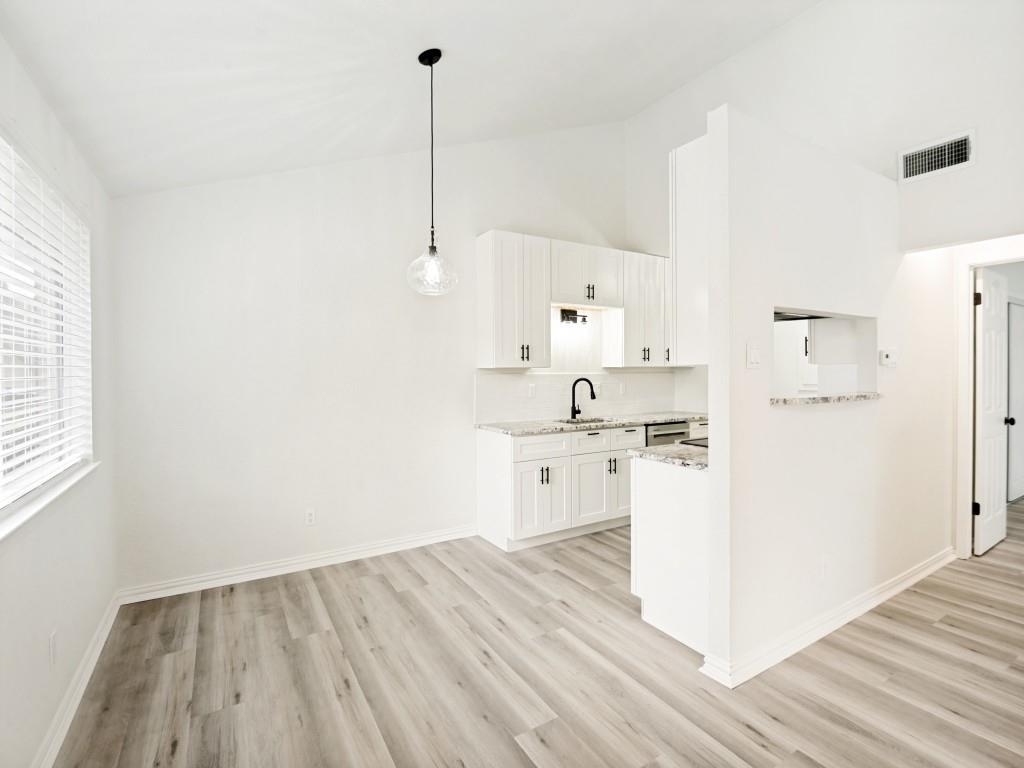 2240 Tarpley Road, Unit 92 Carrollton, TX 75006 - Photo 5 of 22 a view of kitchen with wooden floor
