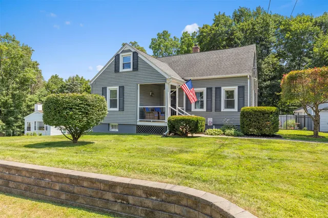 a house view with a garden space