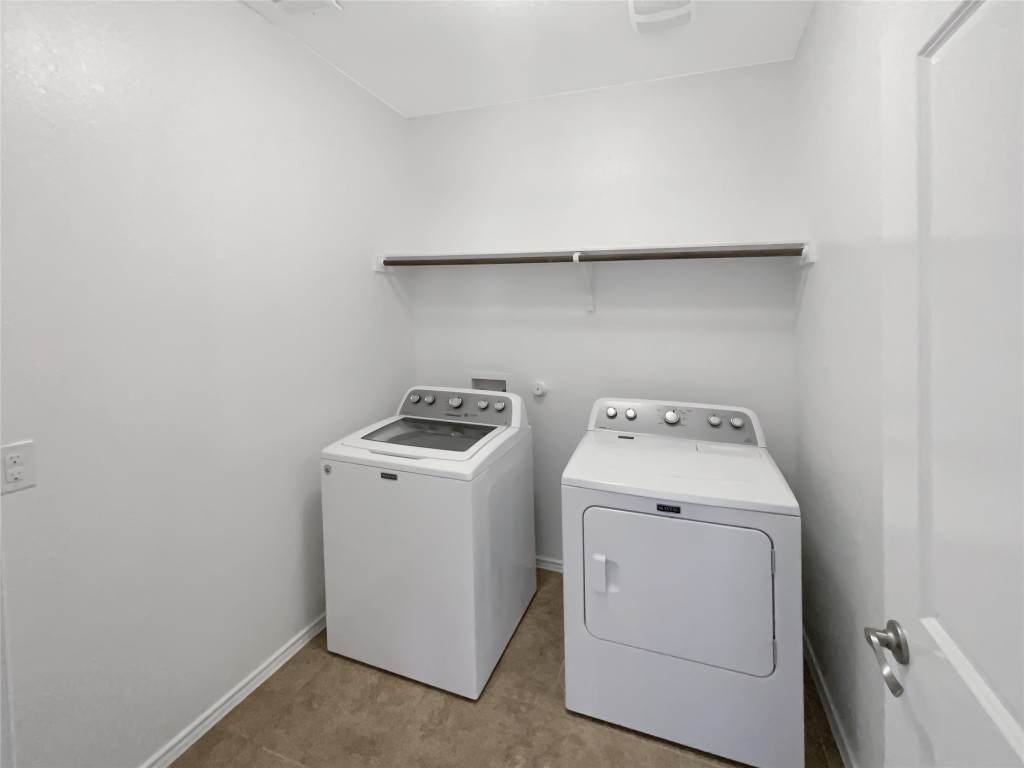 5709 Southerner Way Austin, TX 78747 - Photo 12 of 26 Laundry room with baseboards and independent washer and dryer