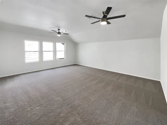 a view of a backyard of the house