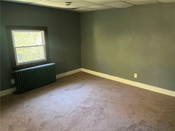 an empty room and closet area