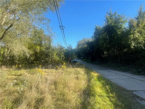 a view of house with yard