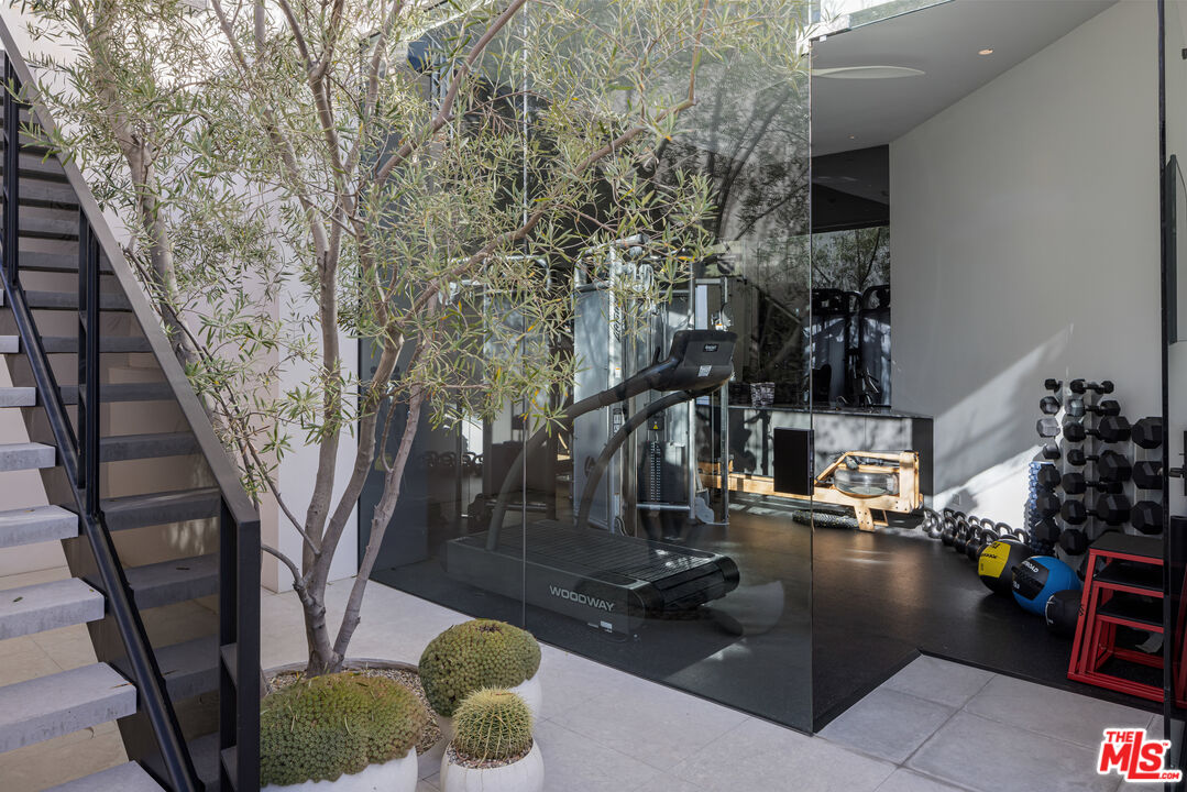 1877 Rising Glen Road Los Angeles, CA 90069 - Photo 15 of 29 a view of outdoor space and porch