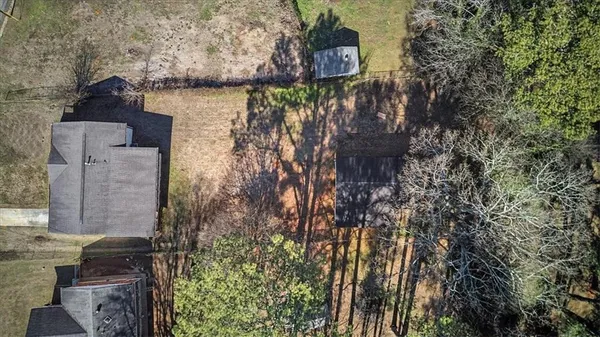 a view of a back yard of the house