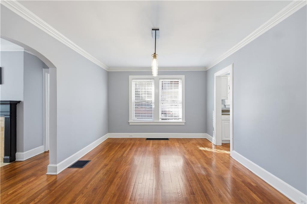 1128 Scott Boulevard Decatur, GA 30030 - Photo 23 of 45 a view of empty room with wooden floor and fan