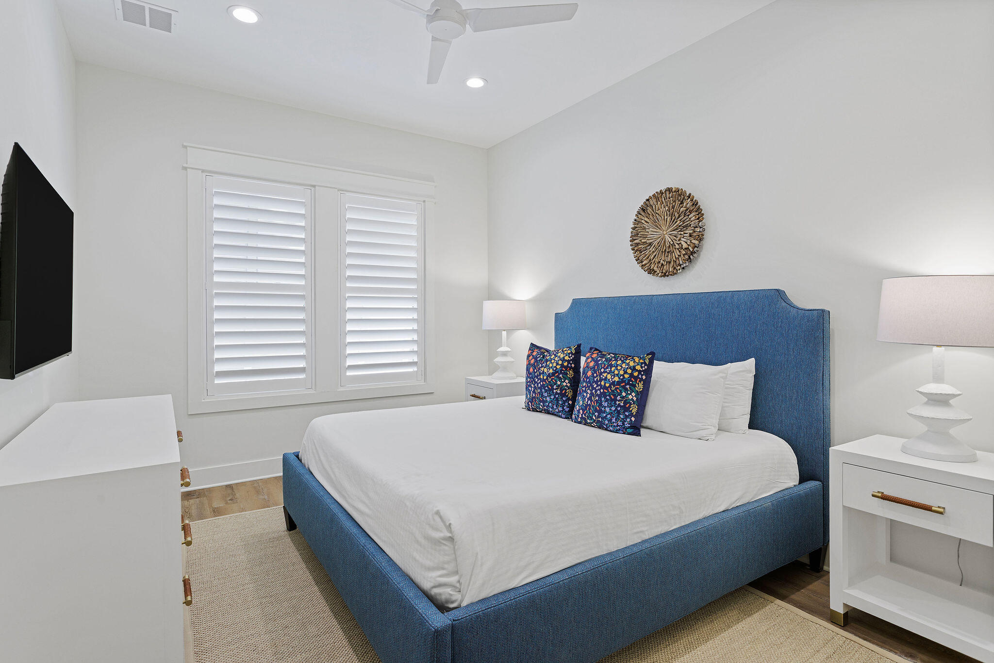 158 Brown Street Santa Rosa Beach, FL 32459 - Photo 12 of 46 a large bed sitting in a bedroom next to a lamp