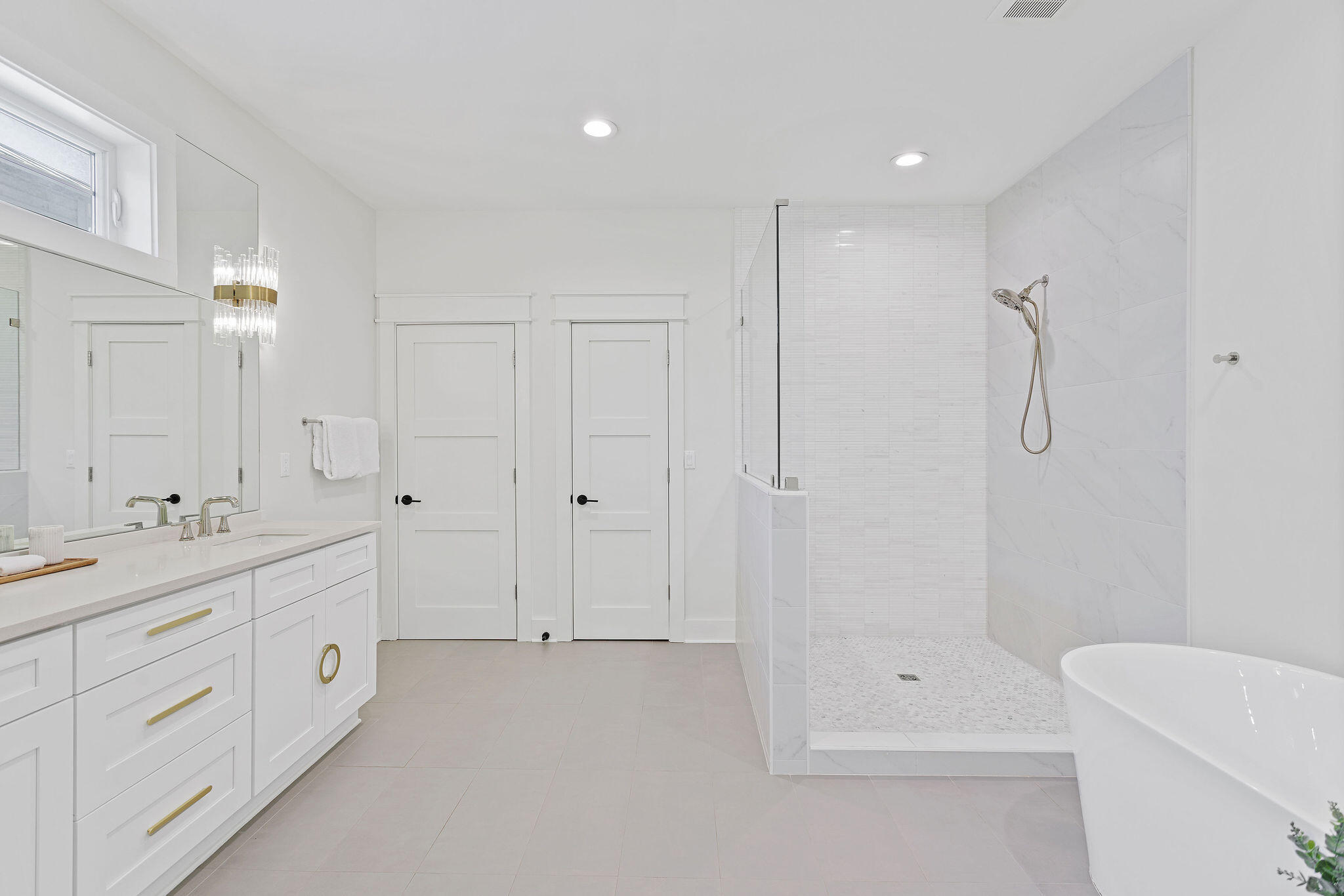 158 Brown Street Santa Rosa Beach, FL 32459 - Photo 21 of 46 a bathroom with a double vanity sink toilet and shower