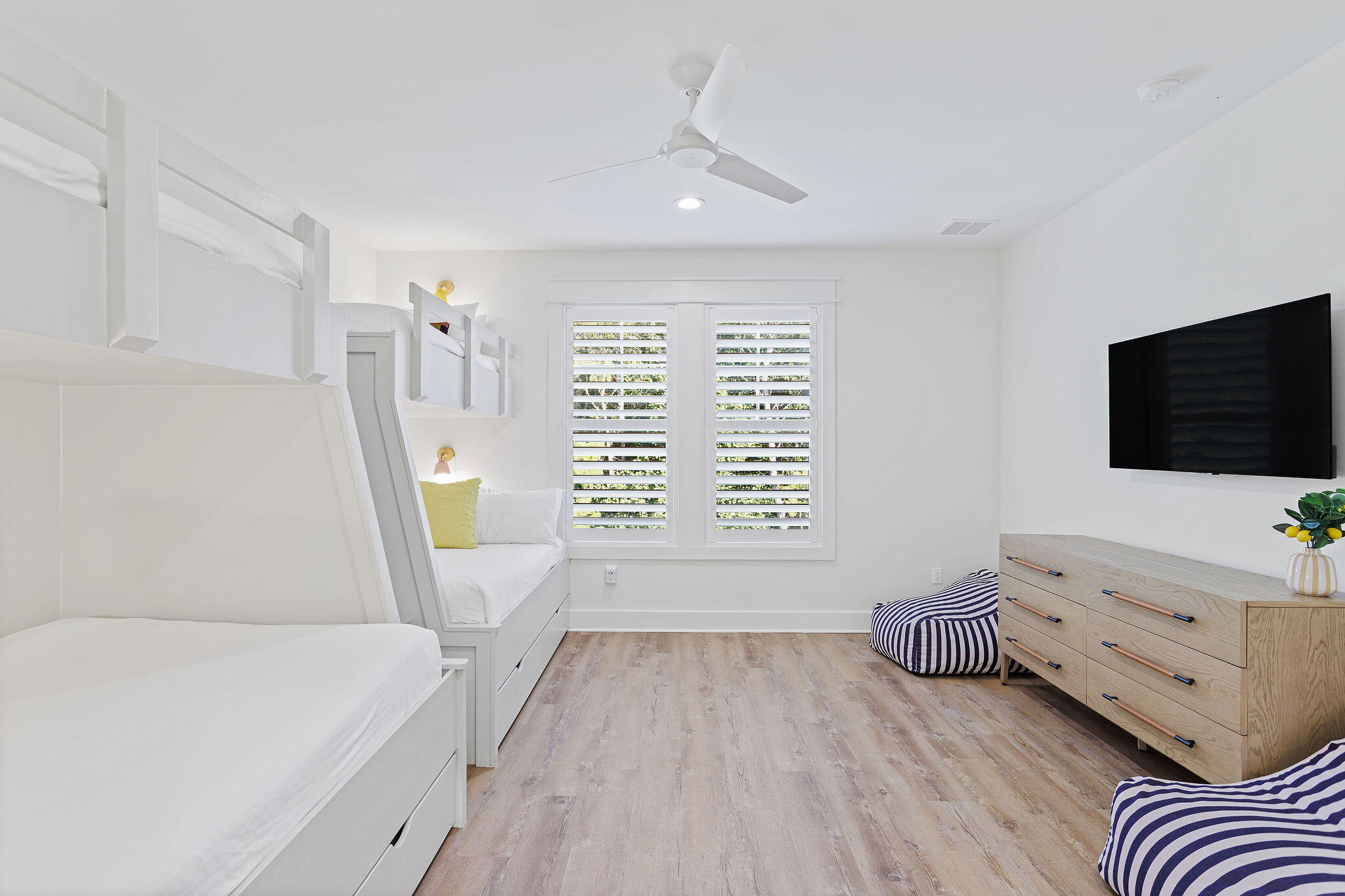 158 Brown Street Santa Rosa Beach, FL 32459 - Photo 30 of 46 a living room with furniture and a flat screen tv