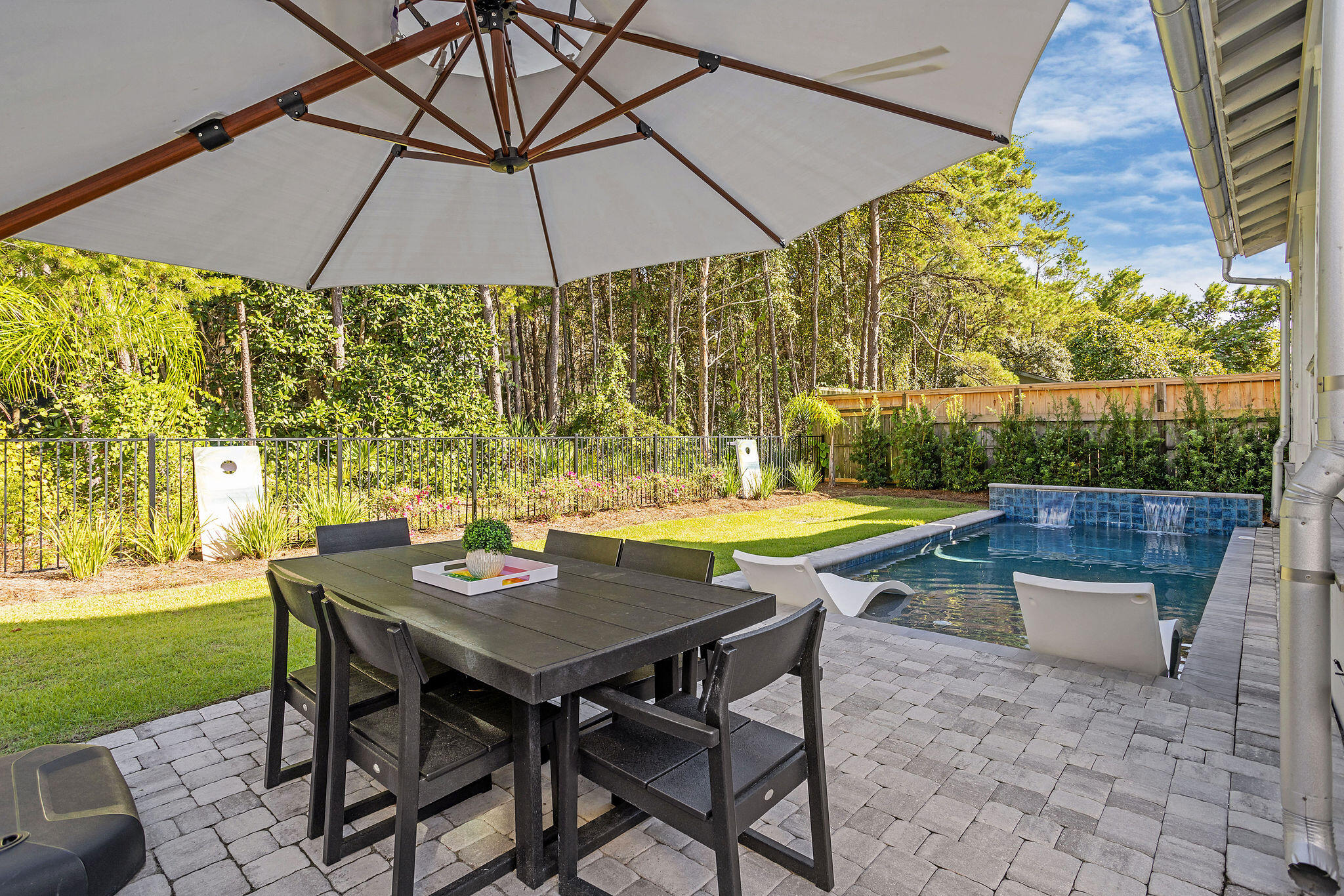 158 Brown Street Santa Rosa Beach, FL 32459 - Photo 35 of 46 an outdoor space with furniture and umbrella