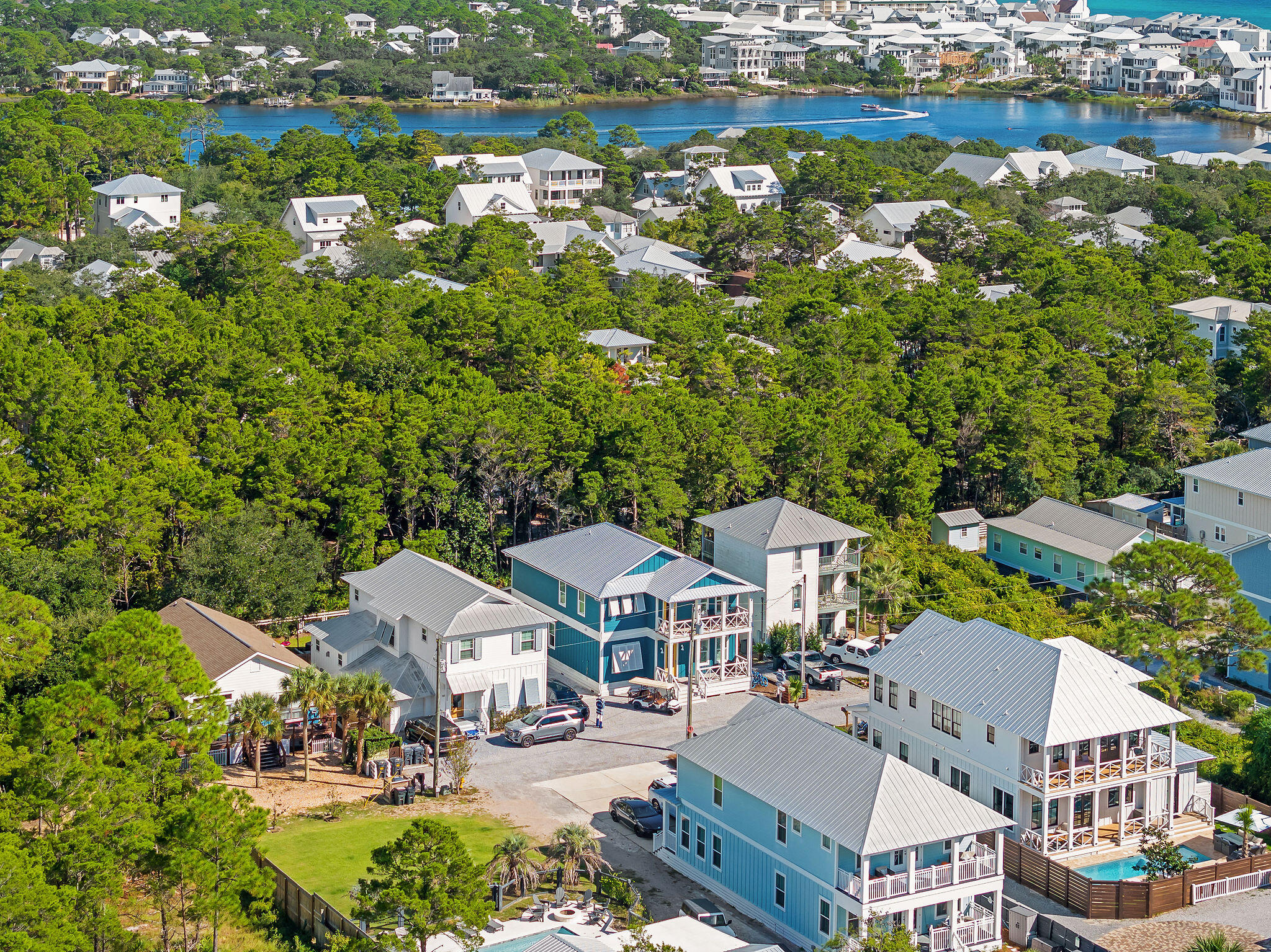 158 Brown Street Santa Rosa Beach, FL 32459 - Photo 39 of 46 an aerial view of residential houses with outdoor space and swimming pool