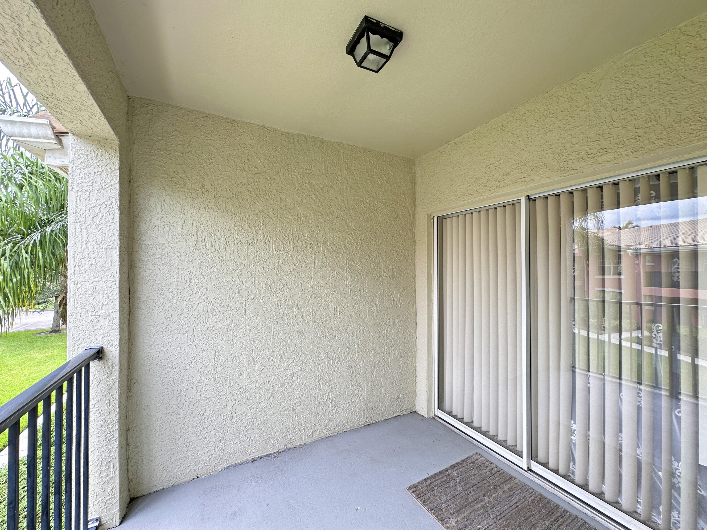 166 Southwest Peacock Boulevard, Unit 34202 Port St. Lucie, FL 34986 - Photo 25 of 56 a view of a room with a window