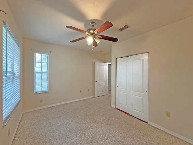 a bathroom with a toilet a sink and bathtub