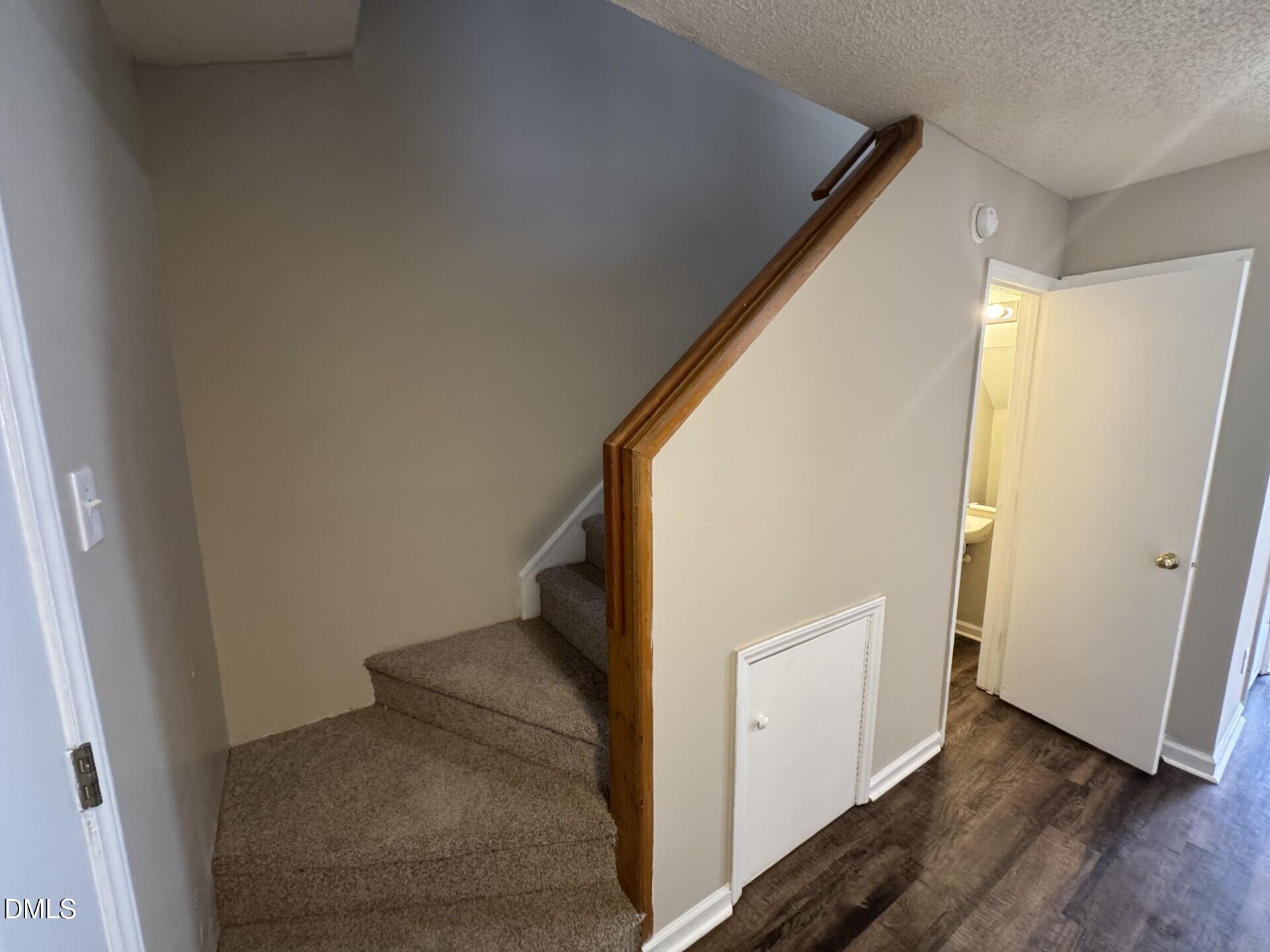 2910 Faversham Place Raleigh, NC 27604 - Photo 14 of 18 stairs and down bath