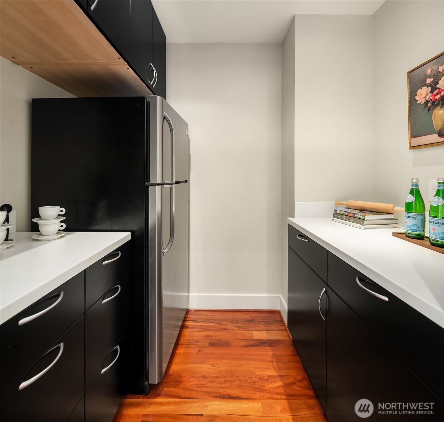 8302 Southwest Dilworth Road Vashon, WA 98070 - Photo 16 of 40 a kitchen with a sink and a refrigerator