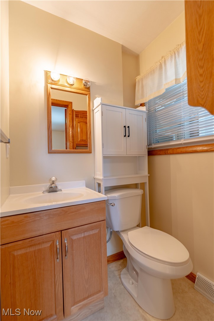 1766 Far View Road Akron, OH 44312 - Photo 16 of 33 Half bathroom featuring toilet and vanity