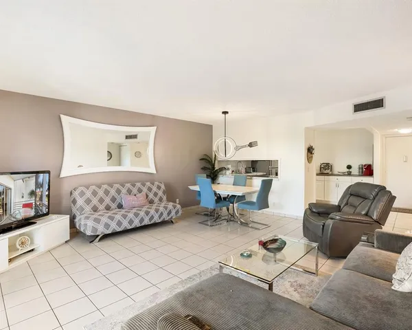 a living room with furniture and a couch