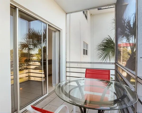a en suite bathroom with a shower and a mirror