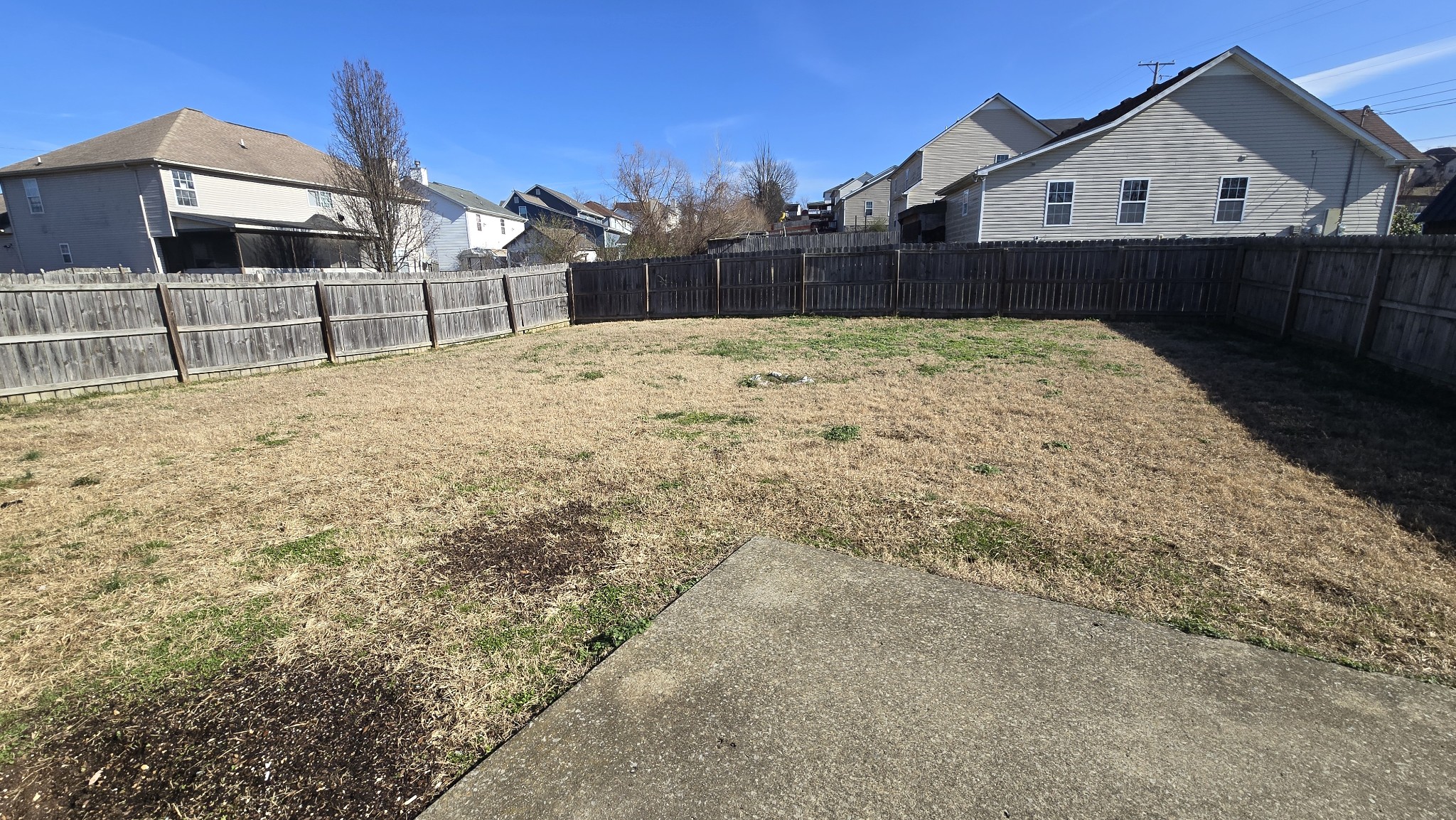 287 Davids Way La Vergne, TN 37086 - Photo 21 of 21 a view of wooden fence next to a yard