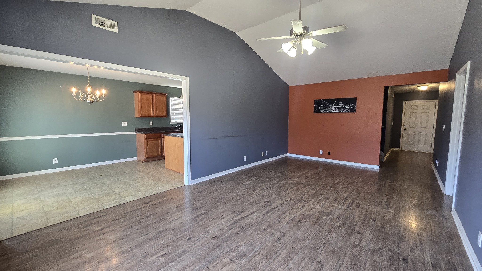 287 Davids Way La Vergne, TN 37086 - Photo 3 of 21 a view of a livingroom with a ceiling fan wooden floor and a ceiling fan