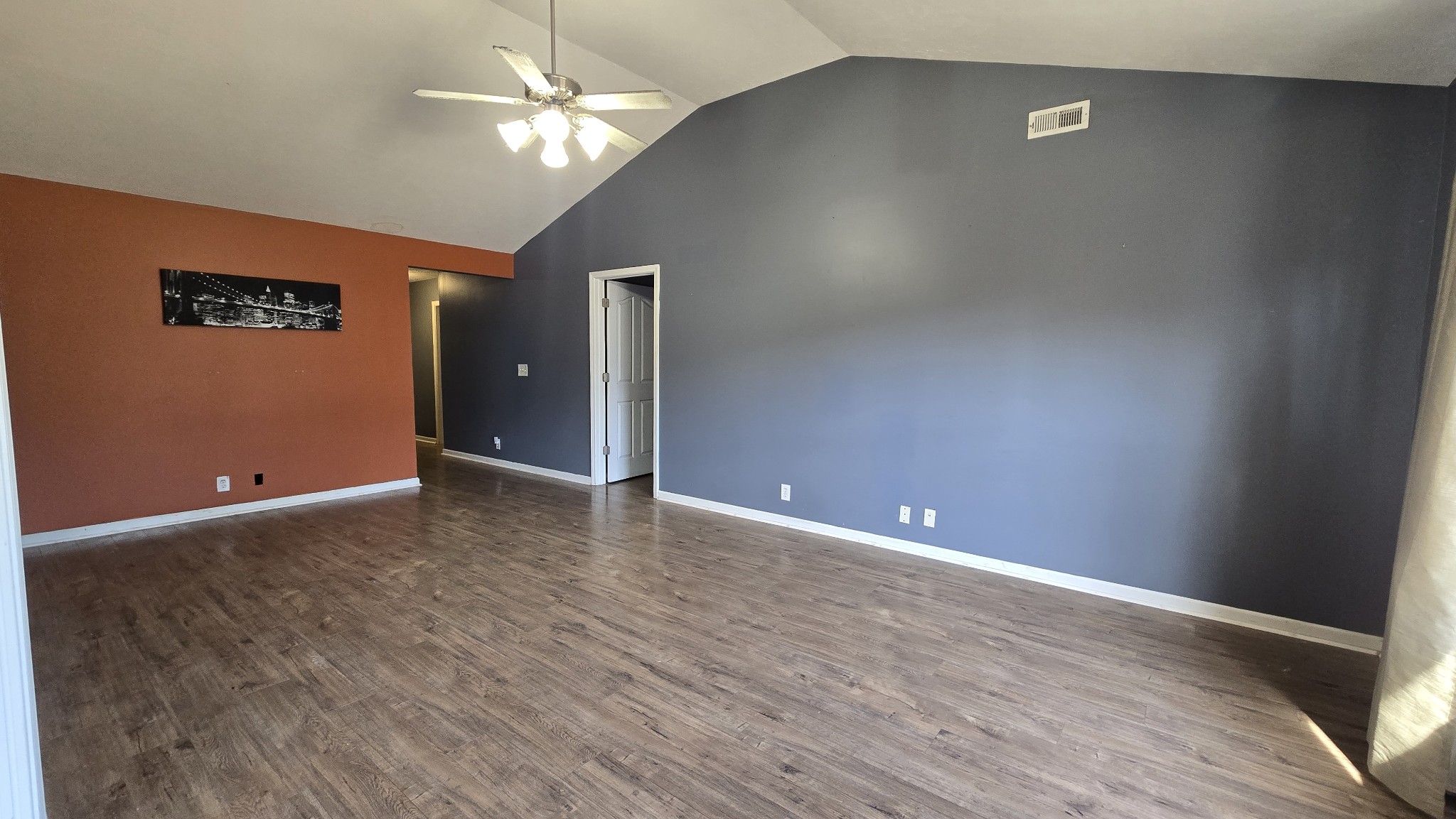 287 Davids Way La Vergne, TN 37086 - Photo 4 of 21 a view of an empty room with window and a ceiling fan