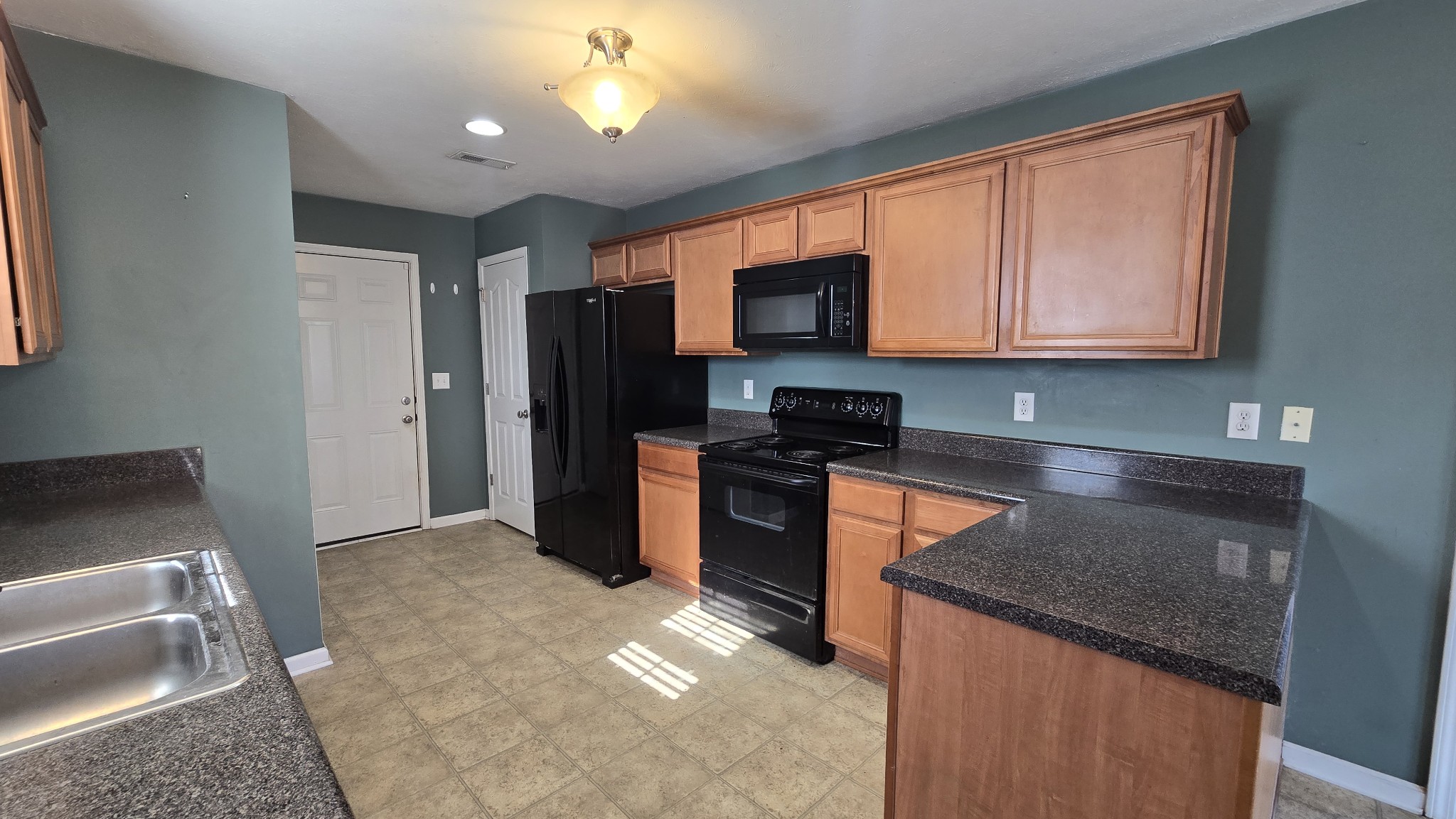 287 Davids Way La Vergne, TN 37086 - Photo 8 of 21 a kitchen with stainless steel appliances granite countertop a refrigerator a stove top oven a sink and dishwasher