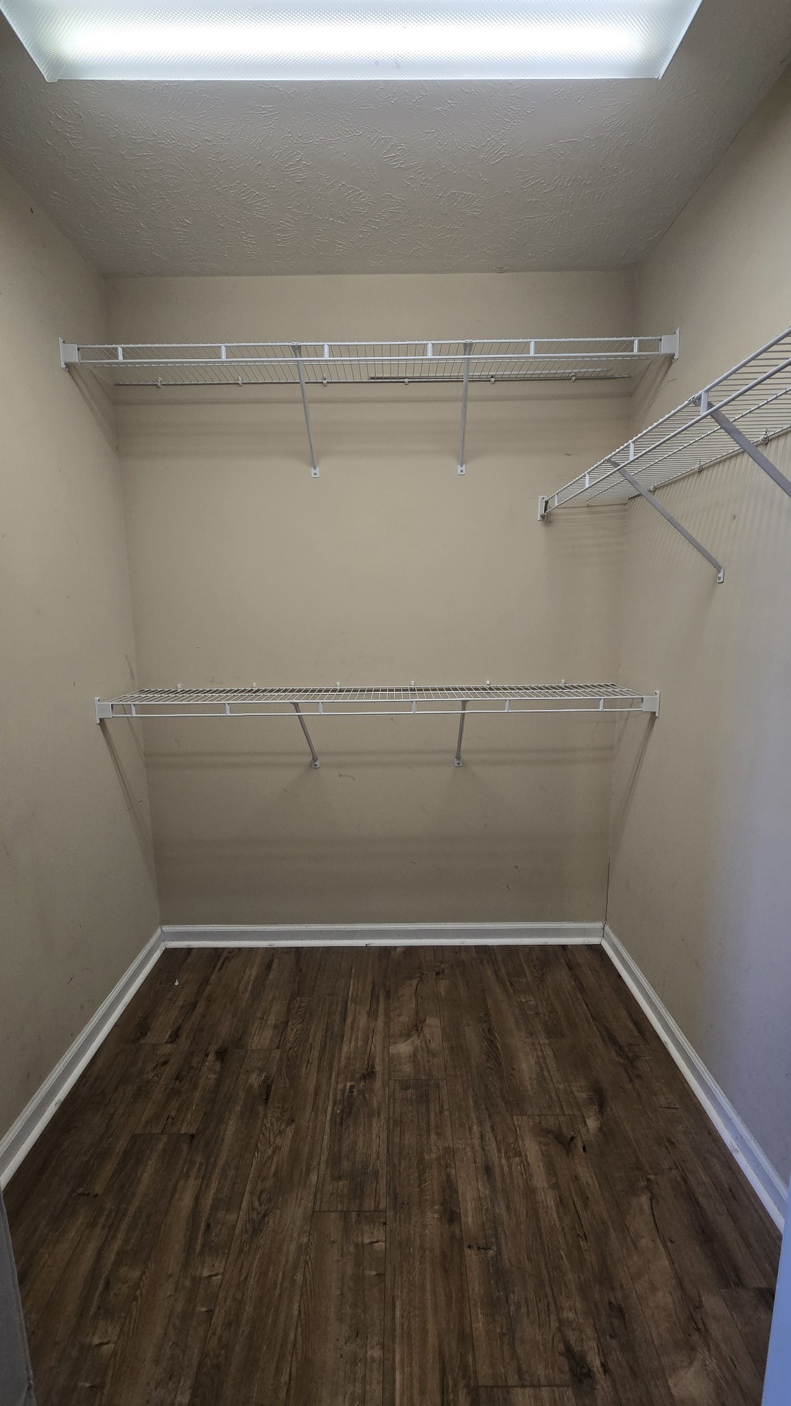 287 Davids Way La Vergne, TN 37086 - Photo 10 of 21 a view of a room with racks on the wall