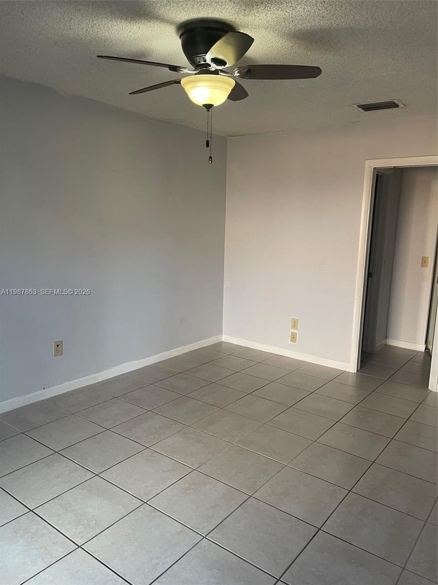 1419 Yellowthroat Street Homestead, FL 33035 - Photo 20 of 26 a view of an empty room