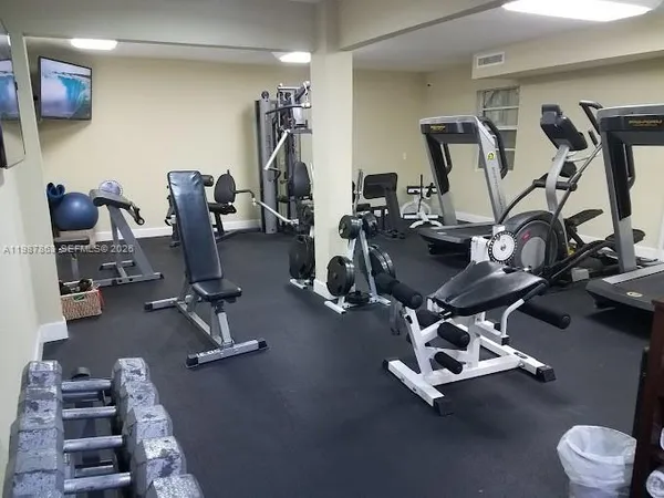 a view of a room with gym equipment