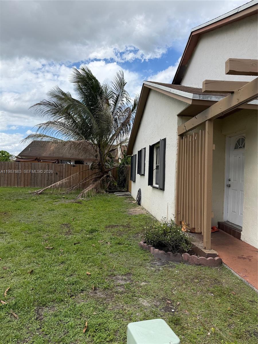 1419 Yellowthroat Street Homestead, FL 33035 - Photo 3 of 26 a view of a house with a backyard