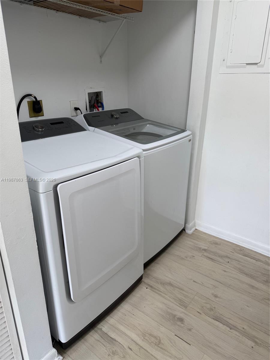 1419 Yellowthroat Street Homestead, FL 33035 - Photo 7 of 26 a utility room with dryer and washer