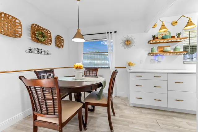 a view of a dining room with furniture