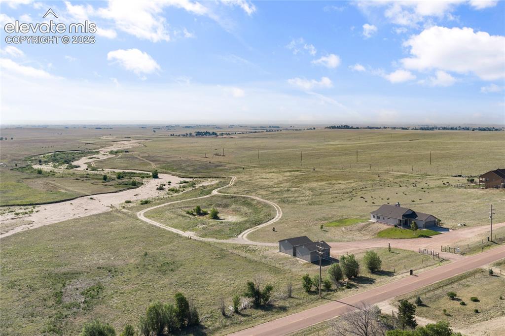 2105 Slocum Road Peyton, CO 80831 - Photo 28 of 31 a view of a lake and city